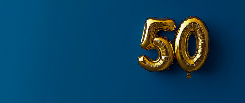 A shiny gold foil balloon in the shape of the number 50, placed on a bright blue background with ample copy space for writing, ideal for a variety of event designs.