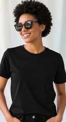 Young woman in black t-shirt mockup, urban streetwear look, stylish model with sunglasses outdoors