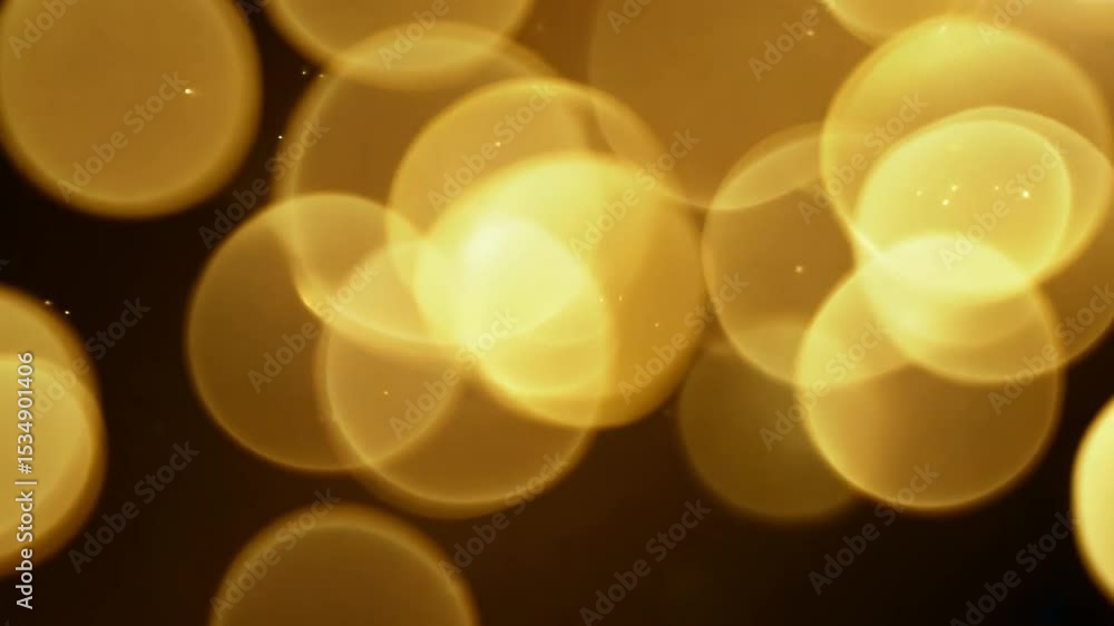 Poster bokeh lights glowing background with soft yellow and gold hues creating a dreamy abstract atmosphere