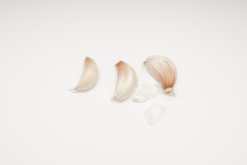 Minimalist garlic cloves photographic food design, still life photo, culinary graphics for website or healthy eating blog and Clean food style