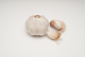 Garlic bulb and cloves photographic still life food photography for cookbooks recipe blogs and...