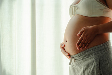 pregnant woman's belly.