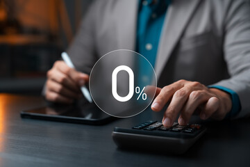 0% interest and financial calculation. Businessman using calculator and tablet to compute payment...
