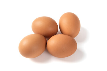 brown raw chicken eggs isolated on white background