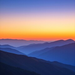 A breathtaking sunset view from the summit of Mount Washington, showcasing vibrant hues of orange, pink, and purple painting the sky over distant peaks.