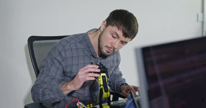 Team of male developers work code control robotics system and software automation project write prompt AI data bot at office. Artificial intelligence, collaboration, robotic, debugging, machine learn.