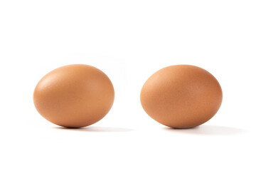 brown raw chicken eggs isolated on white background
