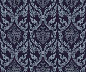 seamless traditional Thai art bold floral pattern in damask style motifs suitable for wallpaper, cloth, curtain, textile, tile, blanket and fabric design isolated over dark blue background.