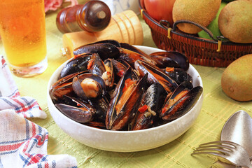 Mussels in cream cheese sauce and garlic.  