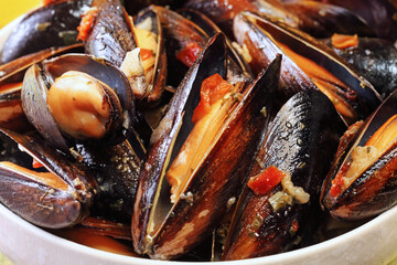 Mussels in cream cheese sauce and garlic.  