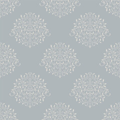Lace leaf ornament in beige color. Seamless light blue design.
