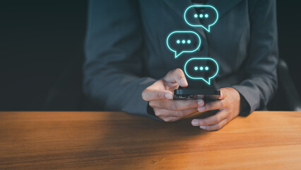 Young woman using a smartphone with technology smart robot AI chatbot for chat. Digital chatbot are assistant conversation for provide access to data growth of business in online network.