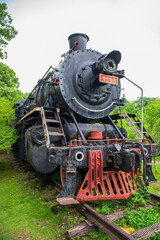 Parked vintage old black steam locomotive