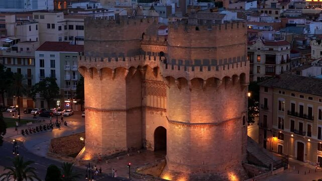 aerial shot of Valencia at night, Torres de Serranos in Valencia at night with illumination, tourism in Valencia, Spain, Spanish travel destination in Catalunya