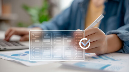 Digital document checklist with person using stylus and laptop. Concept of workflow automation,...