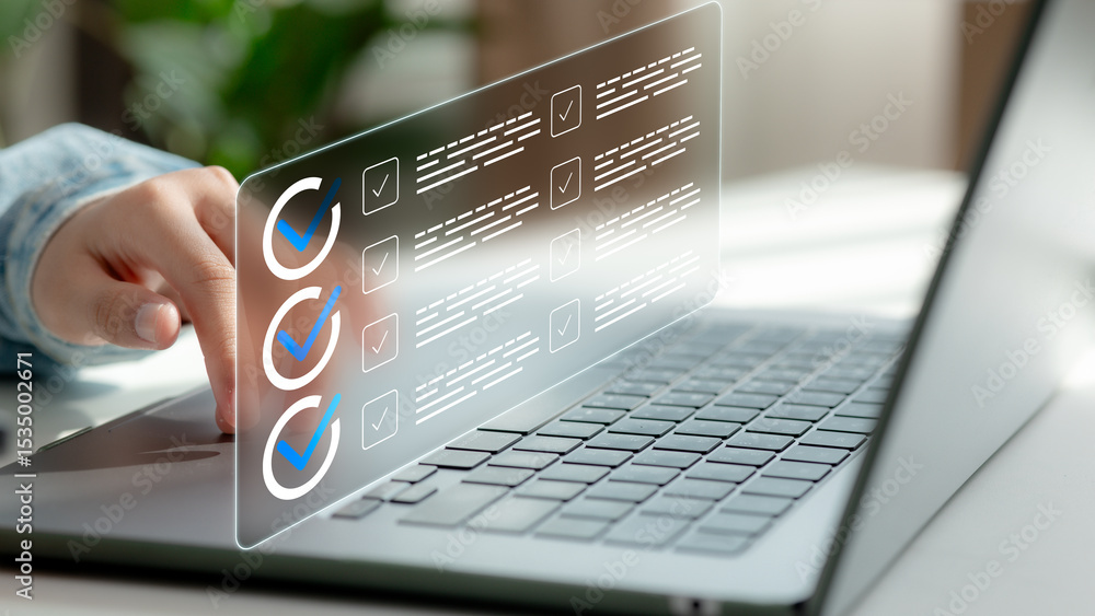 Poster close-up of hand using laptop with digital checklist on screen. concept of online productivity, task
