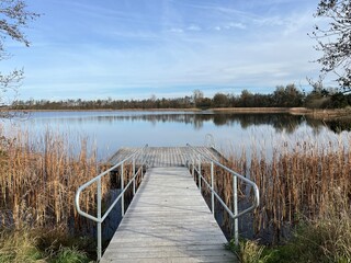 wooden bridge over the lake