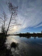 sun and blue sky over the lake