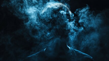 Silhouette of a person enveloped in swirling blue smoke.