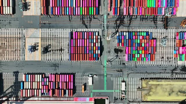 Directly above aerial view of container yard.