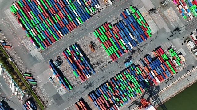 Directly above aerial view of container yard.
