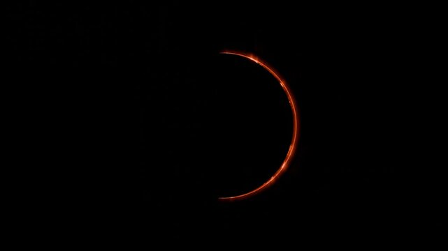 Realistic animation of a partial solar eclipse, showing the moon covering the sun with glowing flares and corona details. Sci-fi style space background in dramatic lighting.