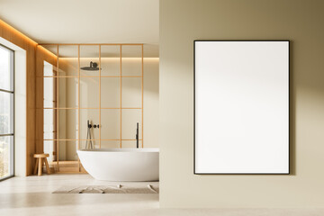 Minimalist bathroom interior with large blank poster mockup on beige wall next to modern bathtub in natural wood and glass partition setting. 3D Rendering