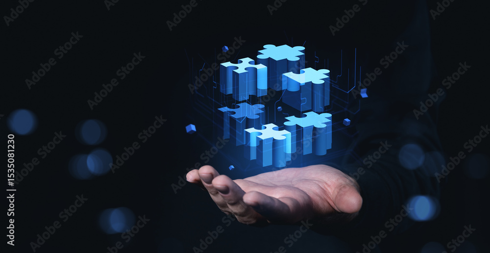 Poster digital puzzle blocks floating above hand on dark background conceptually arranged.