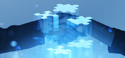 Business handshake with puzzle overlay symbolizing partnership and collaboration.