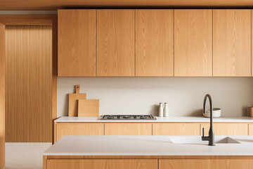 Modern minimalist kitchen interior with wood cabinets and white countertops in natural lighting, featuring clean lines and neutral tones. 3D Rendering
