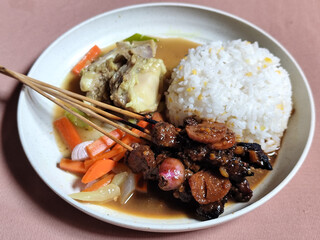 Goulash satay. Sate gulai is a traditional Indonesian culinary menu, curry satay cooked using spices.