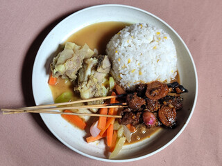 Goulash satay. Sate gulai is a traditional Indonesian culinary menu, curry satay cooked using spices.