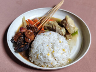 Goulash satay. Sate gulai is a traditional Indonesian culinary menu, curry satay cooked using...
