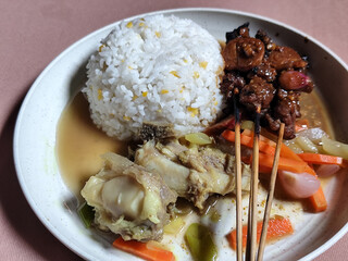 Goulash satay. Sate gulai is a traditional Indonesian culinary menu, curry satay cooked using...