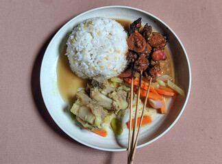 Goulash satay. Sate gulai is a traditional Indonesian culinary menu, curry satay cooked using...