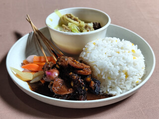 Goulash satay. Sate gulai is a traditional Indonesian culinary menu, curry satay cooked using...