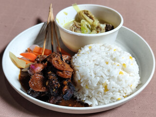 Goulash satay. Sate gulai is a traditional Indonesian culinary menu, curry satay cooked using...