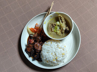 Goulash satay. Sate gulai is a traditional Indonesian culinary menu, curry satay cooked using...