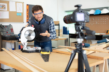diy blogger recording video featuring a circular saw