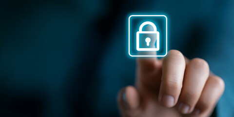  a businessman's hand touching a security padlock icon, security and data protection concept