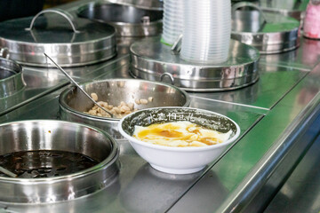 A delicious bowl of soft tofu pudding, known as 