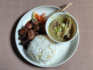 Goulash satay. Sate gulai is a traditional Indonesian culinary menu, curry satay cooked using spices.