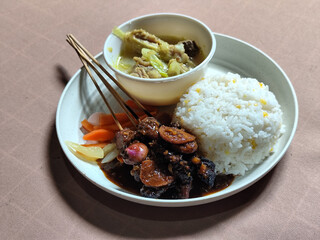 Goulash satay. Sate gulai is a traditional Indonesian culinary menu, curry satay cooked using...