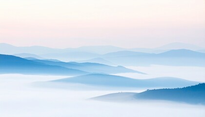 Serene Misty Mountainscape: Peaceful Blue Hues and Tranquil Atmosphere.