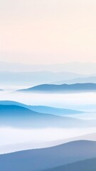Obraz premium Serene Misty Mountainscape Soft Blue Hues Peaceful Landscape.