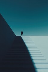 A man is walking down a set of stairs in a dark room