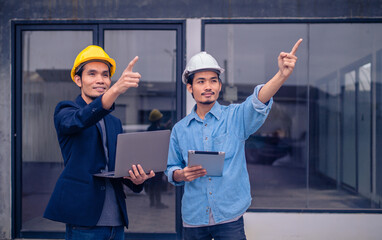 Asian engineers was talking to the team about optimizing computer performance in construction planning.