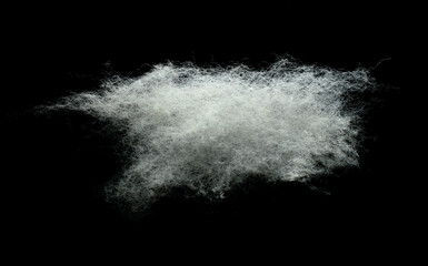 white fiber clouds on a black background