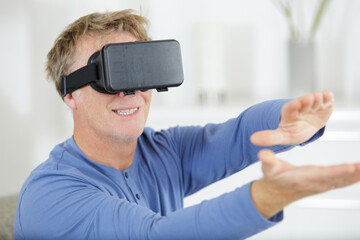 man interacting with virtual reality