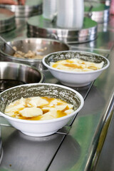 A delicious bowl of soft tofu pudding, known as 